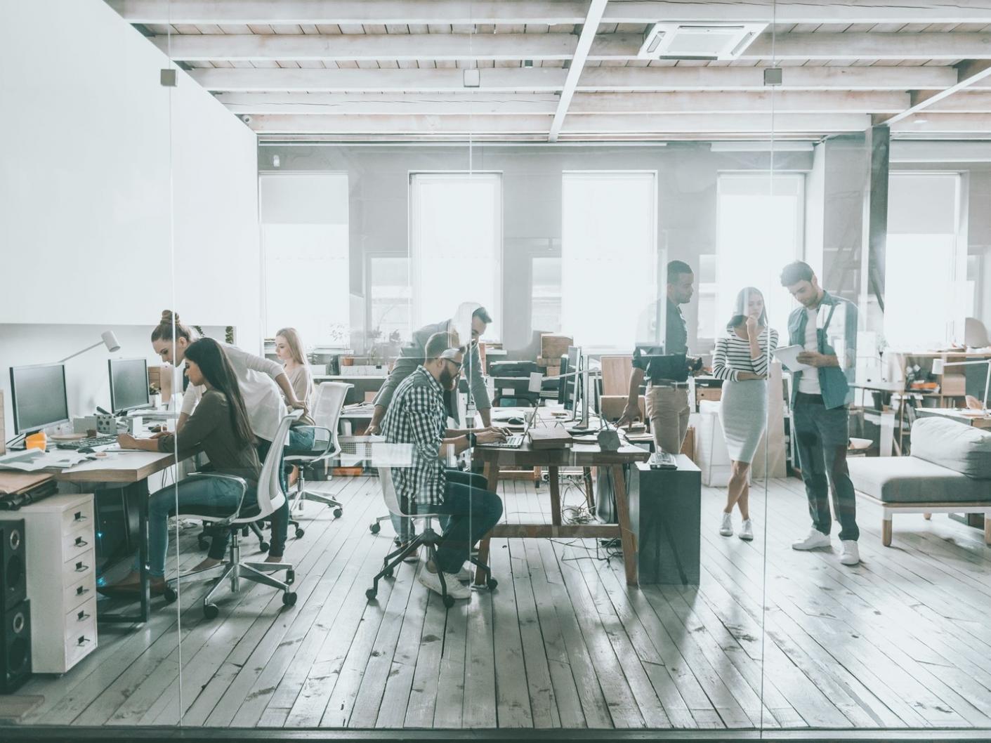 Students engaged in group analysis discussion